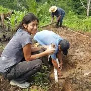 L. Nicole Arellano and two other people digging