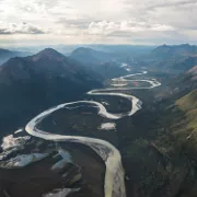 river flowing through a mountain valley